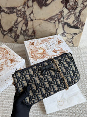 Dark blue monogram underarm bag