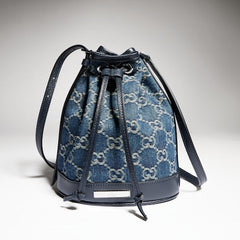 Mini bucket bag with Gucci plaque