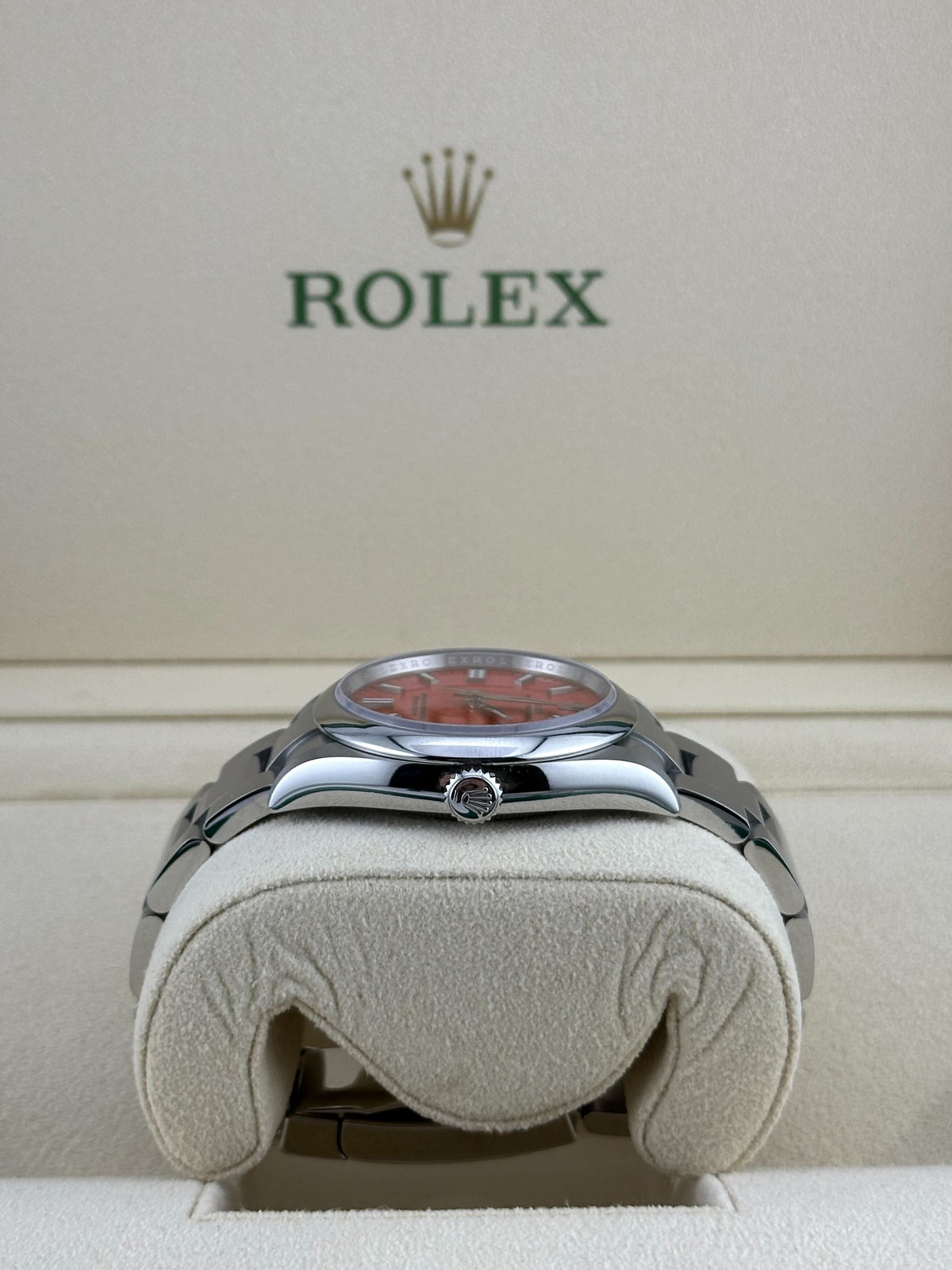 Rolex Oyster Perpetual 126000 Stainless Steel Coral Red Dial