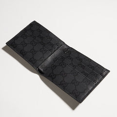 Bi-fold wallet with metal tag - black leather