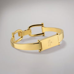 Stirrup motif bangle bracelet - gold-toned brass