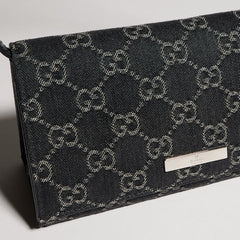 Small pouch with strap and Gucci plaque