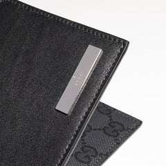 Bi-fold wallet with metal tag - black leather