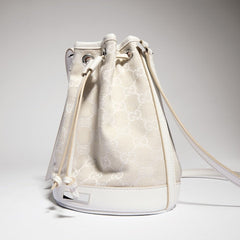Mini bucket bag with Gucci plaque